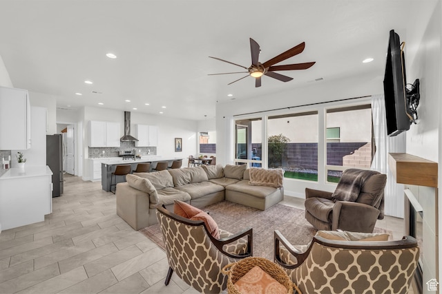 living room featuring ceiling fan