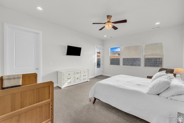 carpeted bedroom with ceiling fan