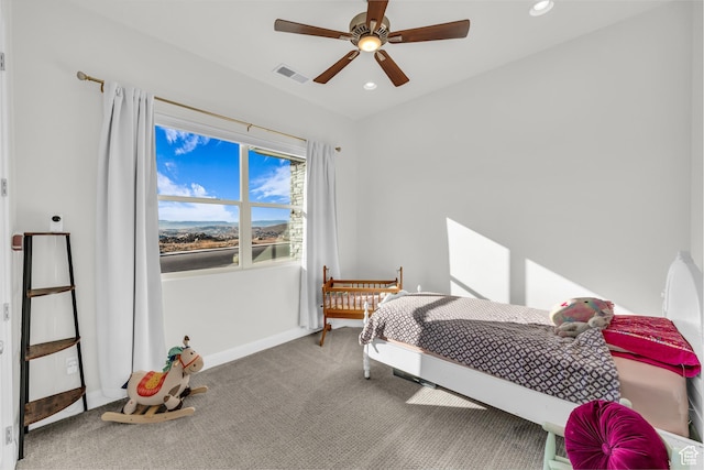 bedroom featuring ceiling fan and carpet flooring