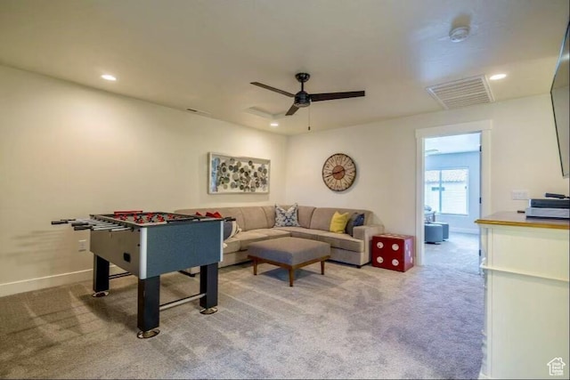playroom featuring ceiling fan and carpet