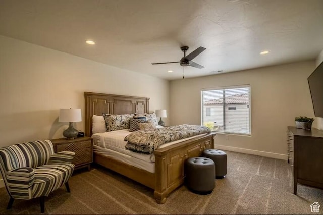 bedroom with ceiling fan and carpet