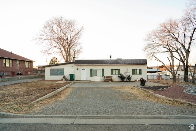single story home featuring a patio