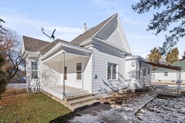 119 N 200 E, Smithfield, UT 84335 - back of property featuring a porch and roof with shingles