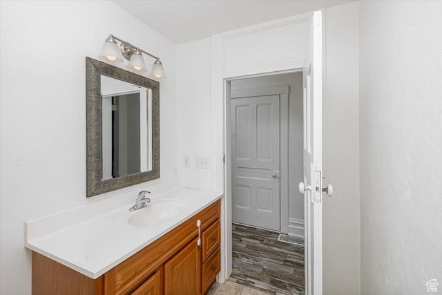 119 N 200 E, Smithfield, UT 84335 - bathroom with vanity and wood finished floors