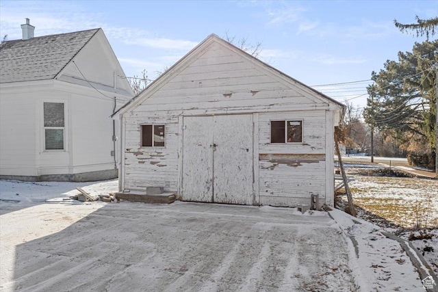 119 N 200 E, Smithfield, UT 84335 - snow covered structure with a storage unit and an outbuilding