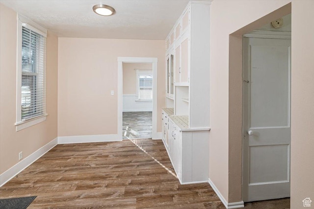 119 N 200 E, Smithfield, UT 84335 - hall featuring dark wood-type flooring and baseboards