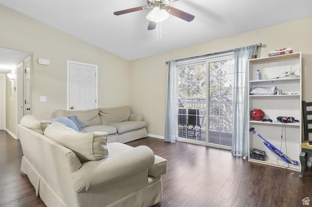 living room featuring lofted ceiling, ceiling fan, and dark hardwood / wood-style flooring