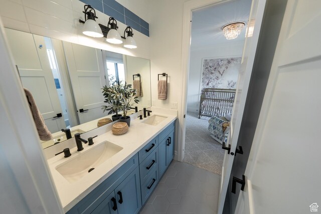 287 E Heritage Dr, Alpine, UT 84004 - full bathroom featuring double vanity, tile patterned floors, and connected bathroom