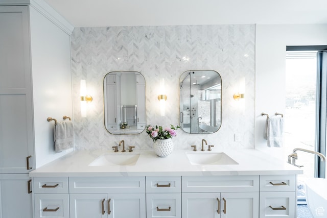 287 E Heritage Dr, Alpine, UT 84004 - bathroom with double vanity, tasteful backsplash, a freestanding tub, and an enclosed shower