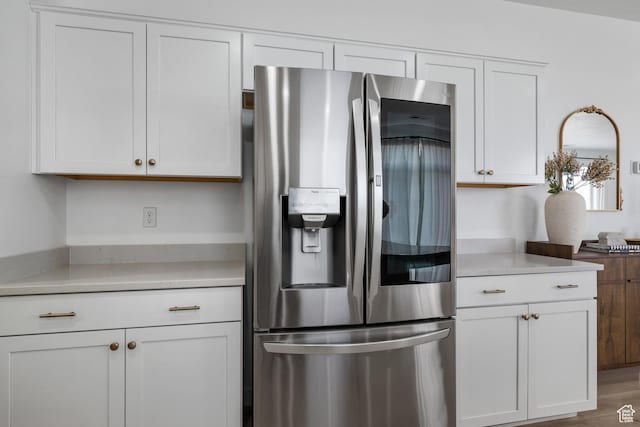 328 W 720th St S, American Fork, UT 84003 - kitchen featuring white cabinetry, wood-type flooring, and stainless steel refrigerator with ice dispenser
