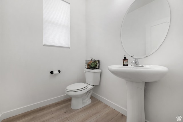 328 W 720th St S, American Fork, UT 84003 - bathroom featuring wood-type flooring, toilet, and sink