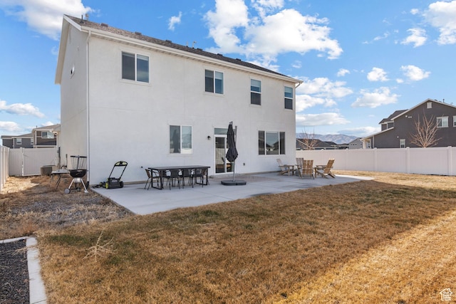 328 W 720th St S, American Fork, UT 84003 - back of house featuring a lawn and a patio area