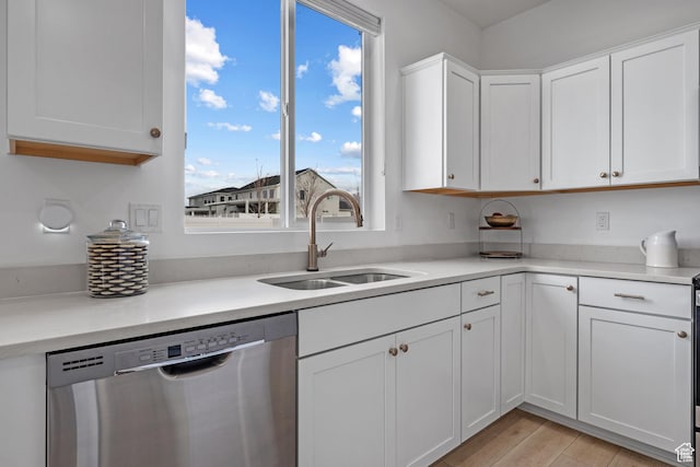 328 W 720th St S, American Fork, UT 84003 - kitchen featuring dishwasher, sink, white cabinets, and light wood-type flooring