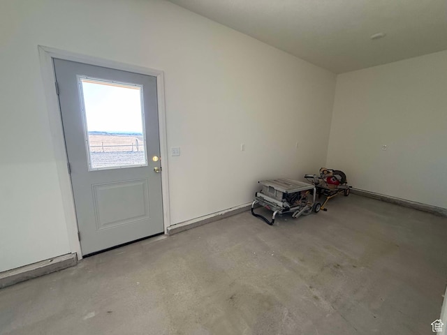 doorway with concrete flooring