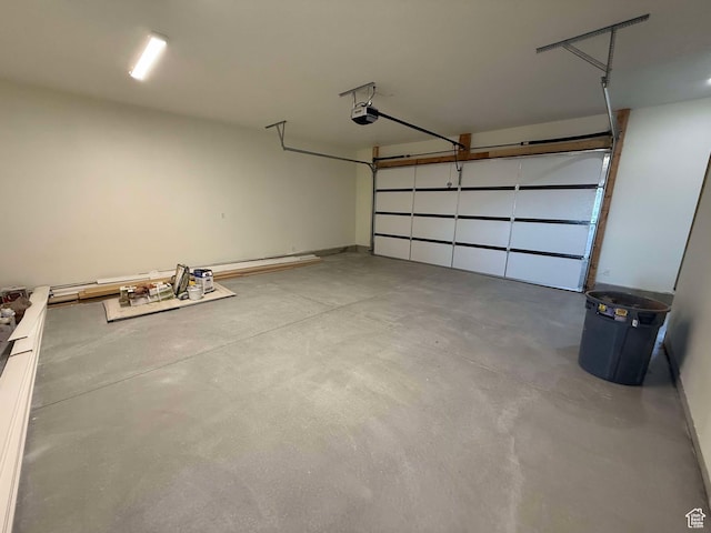 garage featuring a garage door opener