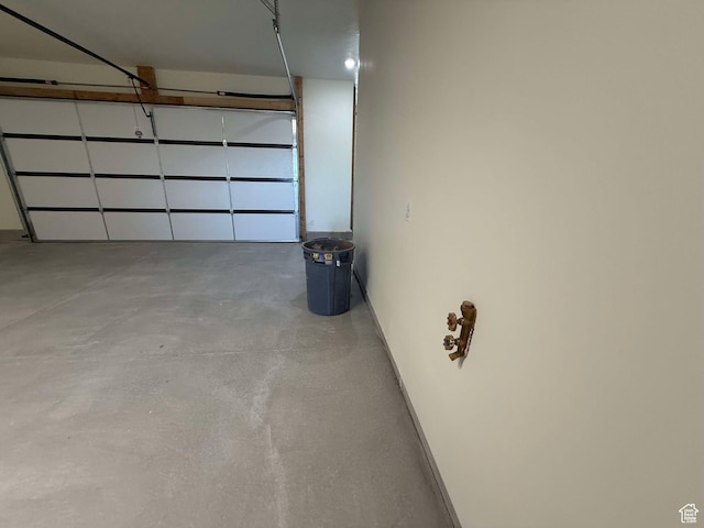 garage featuring baseboards