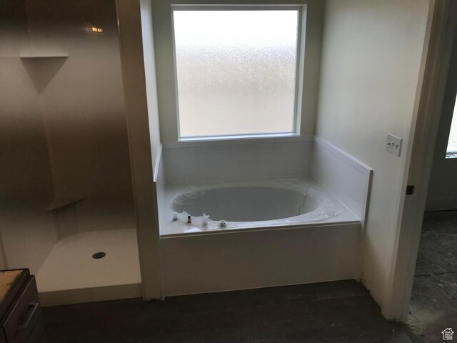 bathroom featuring a bath