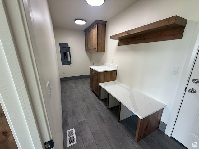 1030 N 200 E, Ferron, UT 84523 - mudroom with electric panel, dark wood-type flooring, and baseboards