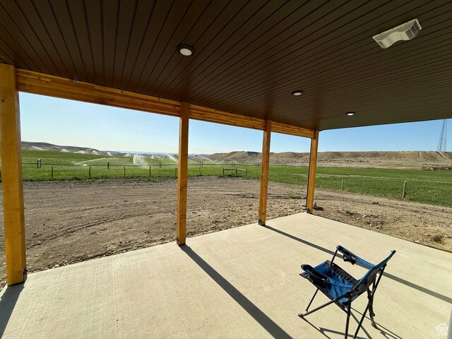 1030 N 200 E, Ferron, UT 84523 - view of patio featuring a rural view and a mountain view