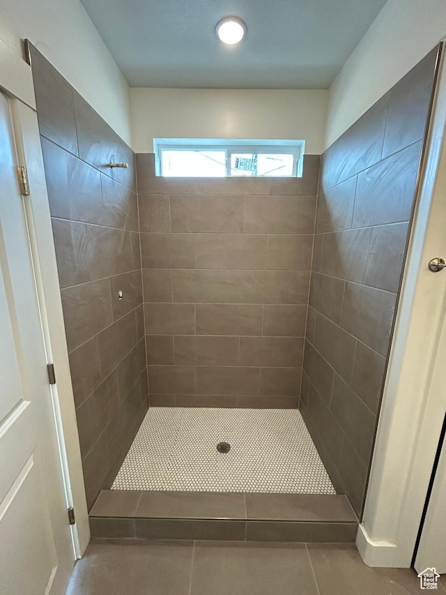 412 W 3085 S, Nibley, UT 84321 - bathroom featuring tile patterned floors and tiled shower