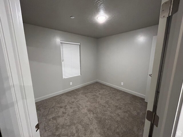 128 N Lone Rock Dr Unit A105, Hurricane, UT 84737 - carpeted empty room with baseboards