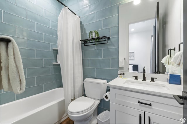 3243 S Hideaway Pl, Hurricane, UT 84737 - full bathroom featuring toilet, vanity, tile walls, and shower / bath combination with curtain