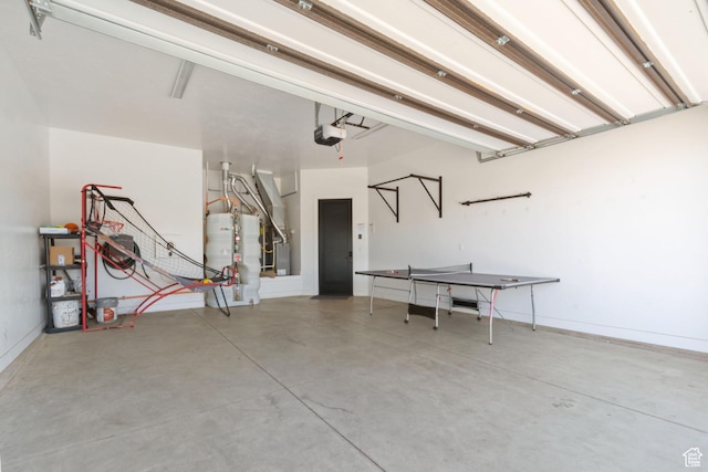 3243 S Hideaway Pl, Hurricane, UT 84737 - garage featuring a garage door opener and gas water heater