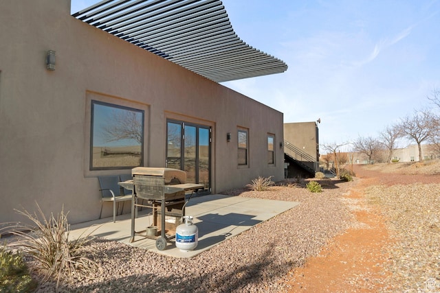3243 S Hideaway Pl, Hurricane, UT 84737 - rear view of house featuring a patio area