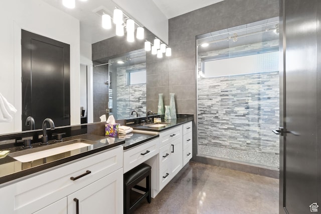 3243 S Hideaway Pl, Hurricane, UT 84737 - bathroom with vanity, tile walls, and concrete floors
