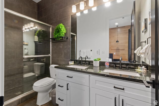 3243 S Hideaway Pl, Hurricane, UT 84737 - bathroom with toilet, vanity, and a shower with shower door