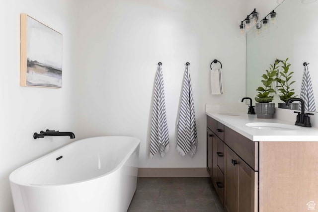 6968 Elk Wallow Dr, Park City, UT 84098 - bathroom with a soaking tub, double vanity, a sink, and baseboards