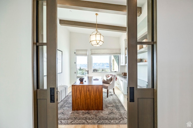 9491 N Promontory Summit Dr, Park City, UT 84098 - home office with radiator heating unit, beam ceiling, and light wood-style floors