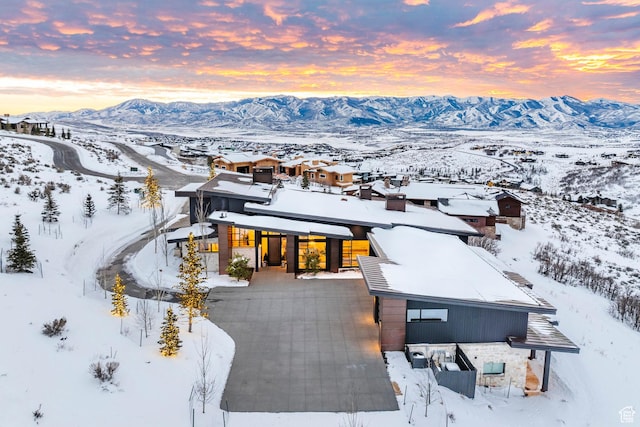 9491 N Promontory Summit Dr, Park City, UT 84098 - snowy aerial view featuring a mountain view