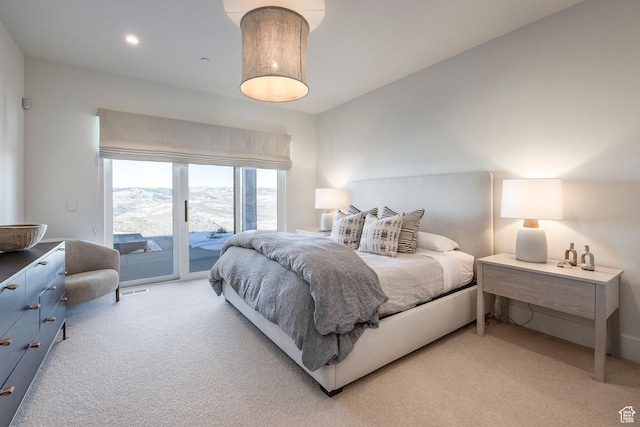 9491 N Promontory Summit Dr, Park City, UT 84098 - bedroom with light carpet, recessed lighting, and access to exterior