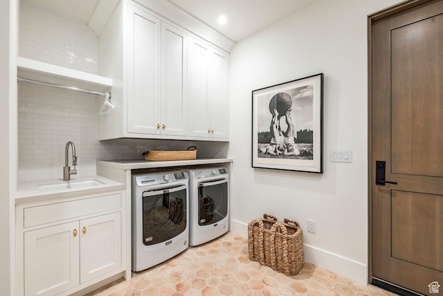 9491 N Promontory Summit Dr, Park City, UT 84098 - laundry room with recessed lighting, separate washer and dryer, a sink, baseboards, and cabinet space