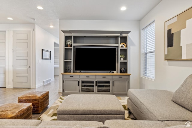 2344 N White Cliff Dr, Lehi, UT 84043 - living room featuring recessed lighting, visible vents, baseboards, and wood finished floors