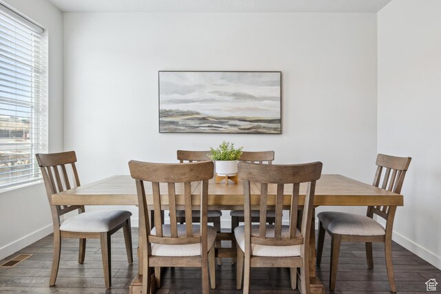 2344 N White Cliff Dr, Lehi, UT 84043 - dining room with a healthy amount of sunlight, baseboards, visible vents, and wood finished floors