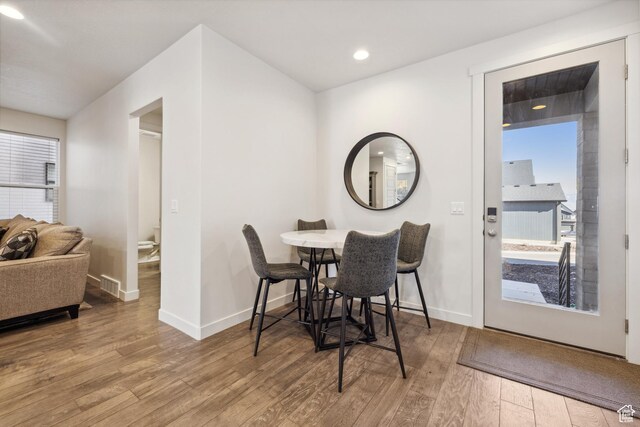 2344 N White Cliff Dr, Lehi, UT 84043 - dining space with baseboards, visible vents, wood finished floors, and recessed lighting