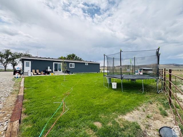 23711 W 12500 S, Stone, ID 83252 - view of yard featuring a trampoline