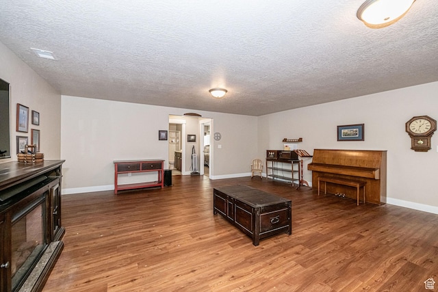 1206 W Holt Farm Ln, South Jordan, UT 84095 - living room featuring wood-type flooring and a textured ceiling