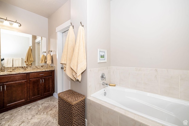 1206 W Holt Farm Ln, South Jordan, UT 84095 - bathroom featuring vanity and a relaxing tiled tub