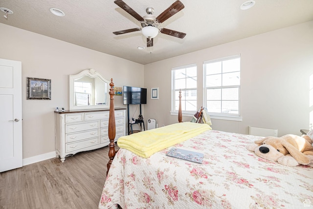 1206 W Holt Farm Ln, South Jordan, UT 84095 - bedroom featuring ceiling fan and light hardwood / wood-style flooring