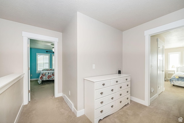 1206 W Holt Farm Ln, South Jordan, UT 84095 - corridor with light colored carpet and a textured ceiling