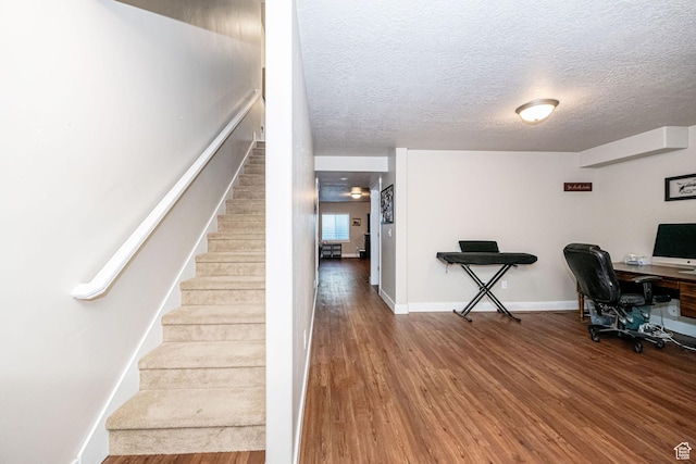 1206 W Holt Farm Ln, South Jordan, UT 84095 - staircase featuring hardwood / wood-style flooring and a textured ceiling