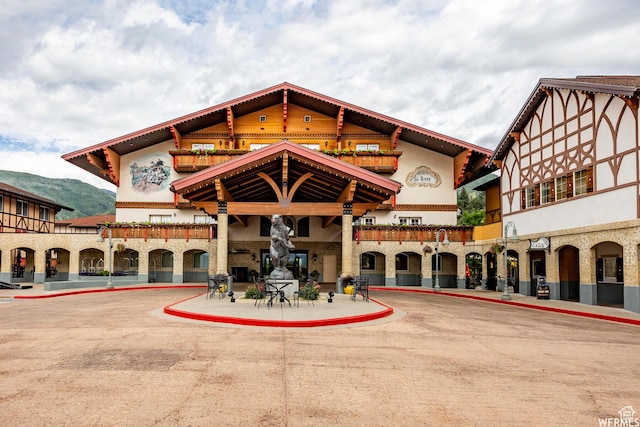 view of building exterior featuring a mountain view