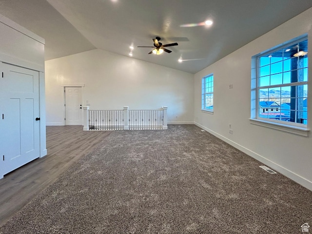 interior space featuring vaulted ceiling and ceiling fan