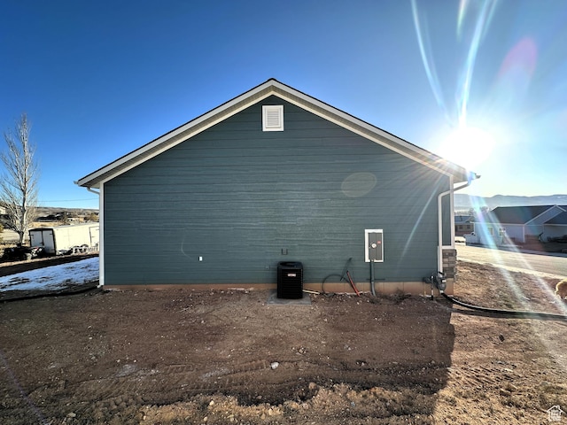 view of home's exterior with central AC unit