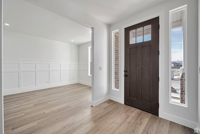 2946 N 1080 W, Lehi, UT 84043 - foyer entrance with recessed lighting, wainscoting, a decorative wall, and light wood-type flooring