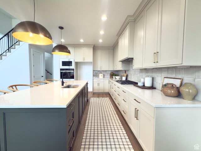 2946 N 1080 W, Lehi, UT 84043 - kitchen featuring a sink, light countertops, black oven, gray cabinets, and stainless steel gas stovetop