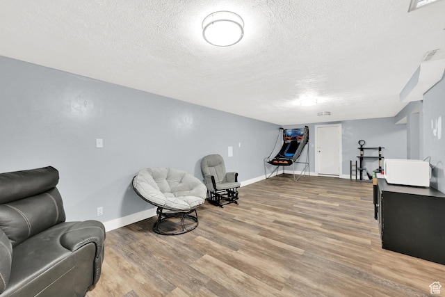 142 Green St, Layton, UT 84041 - living area with a textured ceiling and hardwood / wood-style floors